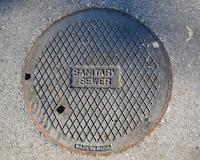 Oxymoron - sanitary sewer plate.JPG
