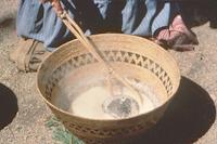 Cooking acorn mush in a basket.TIF