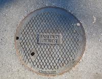 Oxymoron - sanitary sewer plate.JPG